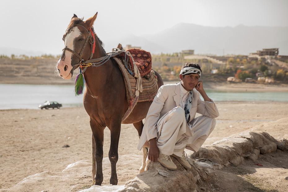 Afghan man with horse at Qargha Lake