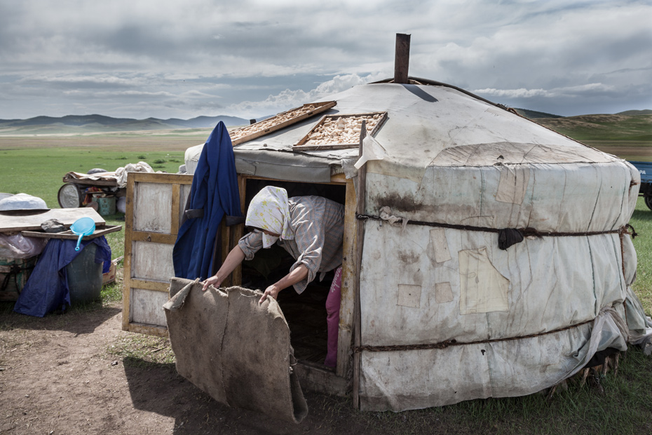 Woman cleans the yurt (Arkhangai, Mongolia)